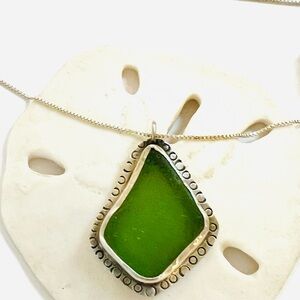 Green and Silver natural sea glass artisan made Necklace with Textured Pendant.